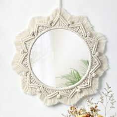 PRICES MAY VARY. 【Size and Detail】The total diameter with fringe is 15"（38cm）, the diameter of the mirror is about 9"（23cm）.NOTE-There is a protective film on the surface of the mirror. Please tear it before usage to ensure its high definition. 【High Quality Material】Our macrame wall hanging is made of 100% pure cotton cord and acrylic mirror，sturdy and premium quality.Exquisite weaving process design,elegant and chic. It is a beautiful wall art,creating a sense of harmony and comfort for your r Antique Mirror Frame, Wall Mirror Decor, Boho Mirror, Macrame Wall Hanger, Macrame Mirror, Handmade Mirror, Handmade Mirrors, Bohemian Handmade, Hanging Wall Mirror