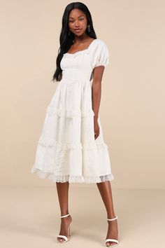 We're totally falling for dreamy and sweet vibes of the Lulus Gorgeously Romantic Ivory Lace Puff Sleeve Tiered Midi Dress! Lightweight woven fabric, with a subtle jacquard design, shapes short puff sleeves with elastic at the cuffs and shoulders. Bodice has a subtle sweetheart neckline and a flattering seamed fit that continues down to a Basque-inspired waist. Tiered skirt boasts adorable lace trim throughout as it falls to a flaring midi hem. Matching lace lines the cuffs and neck to complete Sweet Vibes, Design Shapes, Ivory Lace Dress, Jacquard Design, Tiered Midi Dress, Tier Skirt, Ivory Lace, Tiered Skirt, Dress 100