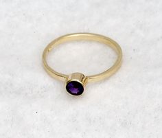 Amethyst 14kt Gold Birthstone Stacking Ring by janeysjewels Minimalist 14k Gold Amethyst Ring As Gift, Minimalist 14k Gold Amethyst Ring, 14k Gold Amethyst Ring Gift, 14k Gold Amethyst Ring With Bezel Setting For Promise, 14k Gold Stackable Amethyst Promise Ring, Dainty Yellow Gold Amethyst Birthstone Ring, 14k Yellow Gold Stackable Amethyst Ring, Gold Stacking Rings, Mother's Ring