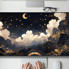 a person typing on a keyboard under a night sky with stars and moon in the clouds