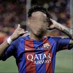 a soccer player with his hand on his head