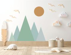 there is a wall with mountains and birds on it