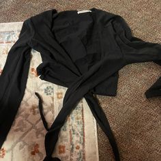 Super Cute Cross Top. Nwot Perfect Condition Casual Black Wrap Outerwear, Black V-neck Outerwear For Day Out, Black Long Sleeve Tops From Urban Outfitters, Fitted Urban Outfitters Tops For Work, Fall Black Wrap Blouse, Black Wrap Blouse For Fall, Urban Outfitters Black Long Sleeve Outerwear, Black Wrap Blouse For Spring, Black Wrap Tops For Spring