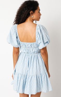 Get ready to feel fabulous in the Kendall Blue Eyelet Puff Sleeve Mini Dress! It's sure to bring a playful and fun vibe to your wardrobe. This puff sleeve mini dress is made from blue and cream pierced eyelet lace fabric, with a smocked corset-inspired bodice, a square neckline, and an attached tiered mini skirt. Style with heels for an elevated look! DETAILS & FIT S: 30" length, 25" waist, 32" bust M: 30.5" length, 27" waist, 33" bust L: 31" length, 29" waist, 35" bust 100% Cotton. Machine wash Eyelet Lace Fabric, Lace Babydoll Dress, Mini Skirt Style, Dress With Puff Sleeves, Tiered Mini Skirt, Puff Sleeve Mini Dress, Boho Pink, Timor Leste, Lace Babydoll