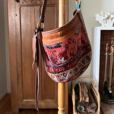 Reby C Handbags Crossbody Bag With Vintage Rug And Genuine Leather. Gorgeous Colors And New Unused Condition. These Bags Are A Work Of Art! This Was Meant To Be A Gift And I Gave Them Something Else So It Needs To Be Loved! Red Crossbody Bucket Bag With Leather Handles, Bohemian Multicolor Bags With Leather Handles, Red Leather Handle Bucket Bag, Bohemian Red Shoulder Bag, Luxury Red Bohemian Shoulder Bag, Bohemian Embroidered Crossbody Shoulder Bag, Bohemian Embroidered Leather Shoulder Bag, Red Leather-handled Bucket Bag, Louis Vuitton Multi Pochette