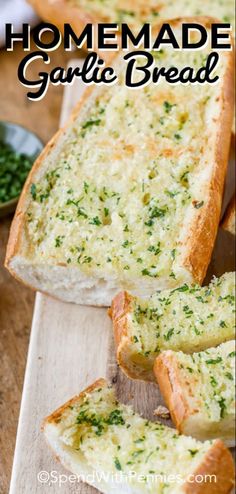 homemade garlic bread sliced on a cutting board