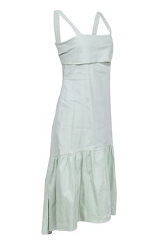 This Theory dress is a breath of fresh air! Crafted from a light green linen blend, it's perfect for those breezy spring days. The cottage core style and flirty silhouette make it a must-have in any wardrobe. Style with espadrilles and you're ready for a day of fun in the sun! Size P (S) Shell 62% Linen, 36% Viscose, 2% Elastane Lining 67% Linen, 29% Nylon, 4% Elastane Fully lined Pullover Tie back detail Two side slip pockets Sleeveless Mid maxi length Bust 32" Waist 34" Shoulder to hem 46" Casual Light Green Cotton Dress, Casual Light Green Knee-length Dress, Green Linen Knee-length Midi Dress, Fitted A-line Linen Beach Dress, Sage Midi-length Summer Dress, Cottage Core Style, Theory Dress, French Girl Chic, Chic Shop