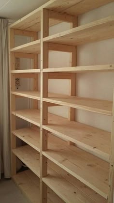 the shelves are made out of wood and have no doors