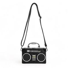 As a square-shaped mini bag, the Radio Pattern Box Bag boasts a sleek and compact design perfect for on-the-go use. Crafted in durable eco leather, this black bag features a unique radio pattern, adding a touch of modernity to your outfit. Carry your essentials in style with this versatile and trendy accessory. Box Bag, Trendy Accessories, Black Bag, Compact Design, Mini Bag, In Style, Sleek, Square, Leather