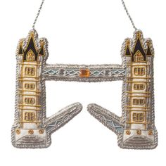 an ornament shaped like the london tower bridge with two towers on each side