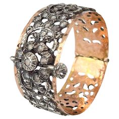 This vintage Tunisian Chichkhan bracelet is a stunning example of North African jewelry, renowned for its rich cultural symbolism and elaborate craftsmanship. The bracelet is a striking piece, crafted from a mix of silver and 9ct gold, with a design that exudes opulence and tradition. Chichkhan is a popular style of jewelry in Tunisia that goes back to the Ottoman period. The good antique "chichkhan" (gold and or silver set with lots of 'diamonds') were also made in red gold, sometimes with real Luxury Handmade Byzantine Bracelets, Bracelet Stones, Tibetan Bracelet, Buddha Jewelry, Jewelry Wardrobe, Gold And Silver Bracelets, Types Of Gemstones, African Jewelry, Crystal Stones