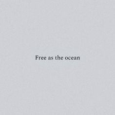 the words free as the ocean are black and white