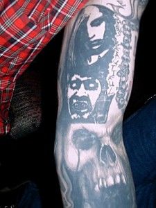 a person with a tattoo on their arm