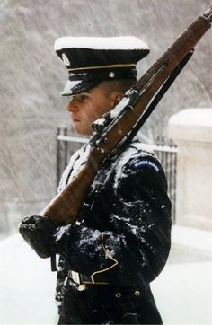 The Tomb of the Unknown Soldier is guarded 24 hours a day, 365 days a year, in any weather by Tomb Guard sentinels. Sentinels, all volunteers, are considered to be the best of the elite 3rd U.S. Infantry Regiment (The Old Guard), and headquartered at Fort Myer, Virginia. Tomb Of The Unknown Soldier, Man In Uniform, Unknown Soldier, Arlington National Cemetery, National Cemetery, Military Love, Military Photos, Us Soldiers, Military Heroes