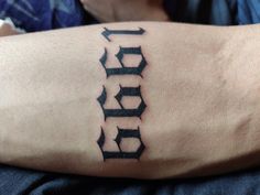 a person with a tattoo on their arm that reads,'hope'in cursive letters