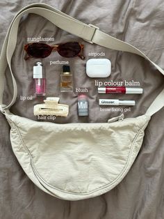 #whatsinmybag #uniqlo #uniqlobag #milk #diorlipoil #clinique #glossier What’s In My Uniqlo Bag, Uniqlo Bag Aesthetic, School Bag Organization, Uniqlo Bag, Mini Emergency Kit, Aesthetic Purse, Glossier Bag, What's In My Purse