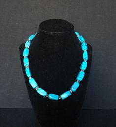 Vintage Black Webbed Godber Turquoise Gemstone Necklace Featuring Silver Spacer Beads With 17 Richly Blue Beaded Necklaces With Stones For Jewelry Making, Adjustable Blue Howlite Necklaces, Blue Chrysocolla Necklace With Stones, Beaded Turquoise Howlite Necklace, Artisan Blue Turquoise Necklace With Gemstone Beads, Turquoise Howlite Beaded Necklace With Gemstone Beads, Southwestern Blue Gemstone Necklace, Blue Beaded Howlite Necklaces, Artisan Blue Jewelry With Stones