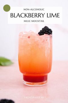 the blackberry lime mule cocktail is garnished with blackberries