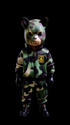 a teddy bear wearing camouflage clothing and black shoes, standing in the middle of a dark room