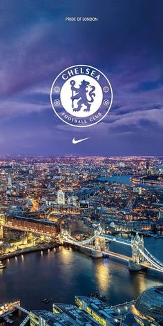 an aerial view of london and the river thames at night, with the logo of chelsea on it