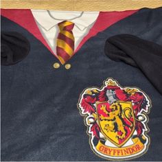 a harry potter shirt with a tie on it