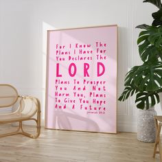 a pink poster with the words for i know the plans i have for you, and a potted plant next to it