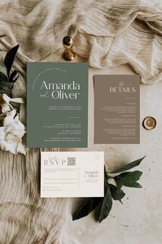 the wedding stationery is laid out on top of an unmade bed with flowers