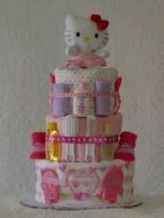 a hello kitty themed cake with pink and white icing