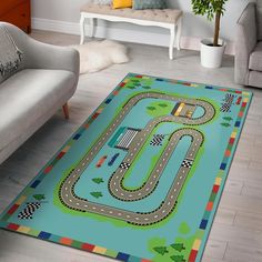 a child's rug with a racing track on it