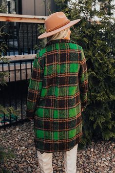 - Bundle up in this cozy plaid coat to keep the chill out! - Fully lined warm material with a green and brown hued plaid print - A collared neckline - Button closure - Long, loose sleeves - Functional low pockets - A relaxed silhouette that ends in a knee length hemline Measurements S : Bust 44", Hip 44", Length 37.5", Sleeve Length 28", Waist 42". M : Bust 46", Hip 46", Length 38", Sleeve Length 29", Waist 44". L : Bust 48", Hip 48", Length 39.5", Sleeve Length 29", Waist 46". Cozy Green Outerwear With Pockets, Cozy Green Outerwear With Button Closure, Green Collared Fall Outerwear, Green Outerwear For Cold Weather In Fall, Green Collared Outerwear For Fall, Collared Green Outerwear For Fall, Cozy Green Outerwear For Fall, Cozy Green Outerwear For Work, Loose Sleeves