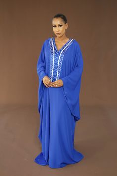 Beautiful Hand Embroidery Kaftan Dress.  This stunning kaftan has an embroidery added on the neckline. Very elegant and easy to wear. Eid V-neck Dress With Dabka Work, Modest Long Sleeve Blue Kaftan, V-neck Dresses With Dabka Work For Eid, Eid Dabka Work V-neck Dress, Modest Long Embroidered Kaftan, Blue Dress With Embroidered Border For Eid, Blue Eid Dress With Embroidered Border, Long Sleeve Kaftan With Embroidered Neckline For Eid, Traditional Maxi Dress With Embroidered Neckline