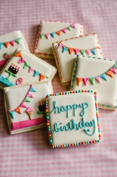 decorated cookies with happy birthday written on them