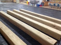 several pieces of wood sitting on top of a tarp