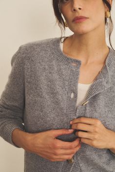 Our 100% cashmere Greta long-sleeve cardigan is the staple piece you need. Perfect for Layering your look and add a touch of something special. Wear it closed up to the top to play it preppy, or open for a more relaxed fit. Unisex and versatile as always, it allows you to express yourself and interpret it as you want, giving you the touch of elegance you need in every fit. Charlotte’s fashion tip: "I love how this piece follows my moods everyday ! When I’m playing the elegance card, I like to wear it on its own, closed, paired with a scarf. When I’m in the mood for a more casual outfit yet with the bit of sophistication I always like, but with the touch of sophistication I always crave for, I leave it open with a nice cashmere and silk top." A true staple piece! Cozy Cashmere Outerwear With Button Closure, Fall Fine Knit Cashmere Cardigan, Cozy Fine Knit Outerwear For Layering, Fall Cashmere Cardigan For Layering, Winter Cashmere Fine Knit Cardigan, Winter Fine Knit Cashmere Cardigan, Everyday Winter Cashmere Cardigan, Cashmere Long Sleeve Soft Knit Sweater Coat, Long Sleeve Cashmere Sweater Coat In Soft Knit