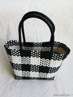 BagForLove - Versatile Plaid Square Tote Bag: Perfect for Casual Outings, Beach Vacations, and Shopping Product Description Color Black Type Straw Bag Strap Type Double Handle Pattern Type Plaid Features High-capacity Closure Type No-closure Composition 100% Polyvinyl Chloride Material PE Size Chart INCH CM Handle Height 7.1 inch Handle Height 18 cm Details Pictures Similar Products h2 { text-align: center; } /* æ¢è¡ */ li{ white-space: normal; word-break: break-all; word-wrap: break-word; } .red-box { width: 100%; display: flex; flex-direction: row; flex-wrap: wrap; justify-content: center; } .red-box > div { width: 190px; height: 250px; margin: 10px; } .red-box > div > a > img { width: 190px; height: 250px; } .size-box { width: 100%; margin: auto; white-space: nowrap; } .table { border Polyvinyl Chloride, Beach Vacations, Word Wrap, Bag Straps, Beach Vacation, Bags Shoulder, Straw Bag, Shoulder Bags, Straw