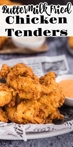 fried chicken tenders on a plate with dipping sauce in the background and text overlay that reads, buttermilk fried chicken tenders