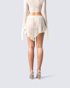 Be everyone's fantasy in this whimsical ivory lace mini skirt 🤩 Crafted from lightweight lace fabric - it features tiered ruffles, an asymmetrical back body, a front drawstring bow, and a lettuce edge for the ultimate sweet, and dreamy flair ✨ White Fitted Lace Mini Skirt, Summer Party Skirt With Lace Top, Lace Asymmetrical Skirt With Lace Trim, Summer Party Mini Skirt With Lace Trim, Lace Trim Asymmetrical Skirt, Asymmetrical Lace Skirt With Lace Trim, White Lace Mini Skirt With Ruffles, Asymmetrical Lace Ruffled Skirt, Flirty Lace Party Bottoms