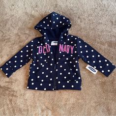 Baby Toddler Girls Old Navy Zip Up Hooded Sweatshirt Brand New With Tags Size 12 18 Months Navy With Polka Dots And Purple Brand Logo Thicker Sweatshirt Material To Use As Jacket Or Coat Spring Fall Winter Warm Cold Weather Zip-Up Jumper Hood Hooded Cute Blue Tops With Drawstring Hood, Cotton Hoodie For Playtime, Cute Blue Hoodie Top, Cute Cotton Hoodie For Playwear, Blue Hooded Top For Playtime, Blue Cotton Hoodie For Playtime, Cute Purple Cotton Hoodie, Playful Blue Hoodie Top, Cute Cotton Outerwear For Play