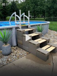 an above ground swimming pool with steps leading up to it and plants growing out of the bottom