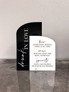 a black and white menu card with the words thank you written on it