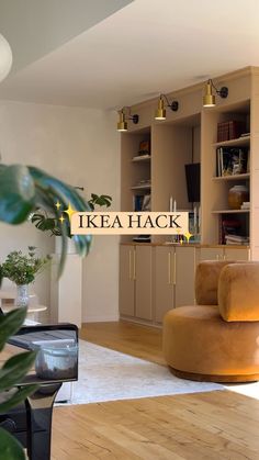 a living room filled with furniture next to a book shelf