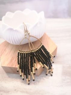 Beaded earrings made of japanese glass beads, black and gold color, gold plated metallic parts. For other color combination please contact me 8 cm long Elegant Black Tassel Earrings With Beaded Fringe, Black Beaded Fringe Tassel Earrings As Gift, Elegant Black Beaded Earrings With Tassels, Elegant Black Tassel Earrings With Round Beads, Elegant Black Beaded Fringe Chandelier Earrings, Black Beaded Fringe Earrings As Gift, Black Tassel Earrings With Dangling Beads As Gift, Handmade Gold Tassel Earrings With Round Beads, Gold Dangle Earrings With Black Beads