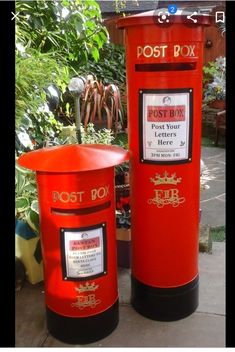 two red post boxes sitting next to each other