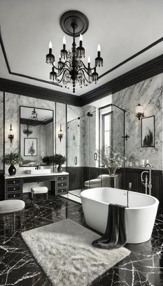 an elegant bathroom with black and white marble flooring, chandelier and bathtub