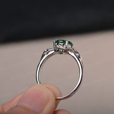 This is a gorgeous handmade creation, a combination of beauty, simplicity & Elegance. The 7*7mm round cut lab emerald is crafted in solid sterling silver and with rhodium plated. 14K white gold/rose gold/yellow gold available as well,pls contact me if you need. All item is sent in a beautiful gift box You can realize more lovely stuff clicking the link https://www.etsy.com/shop/knightjewelry?refshopsection_shophome_leftnav Please leave the correct address and you phone number for delivering Wedding Emerald Ring In 14k White Gold, Emerald Bezel Setting Ring For Wedding, Elegant Bezel-set Emerald Ring For May Birthstone, Elegant Emerald Ring With Bezel Setting, Timeless Emerald Ring With Accent Stones For Promise, Exquisite Emerald Promise Ring, Timeless Round Emerald Promise Ring, Dainty Solitaire Emerald Cut Emerald Ring, Sterling Silver Emerald Ring With Accent Stones