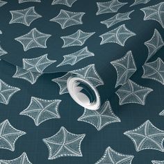 an image of a wallpaper with white leaves on dark blue background, it looks like something out of space