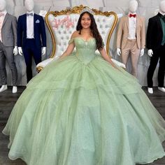 Step into a world of elegance with this Sage Green Off-Shoulder Corset Quinceanera Dress. The soft sage green hue and dreamy tulle fabric create a look that’s both modern and enchanting, perfect for making your quinceanera unforgettable. The off-the-shoulder neckline adds a touch of sophistication, while the sleeveless Corset Ball Gowns, Princess Prom Dresses