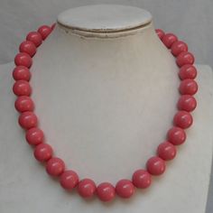 Welcome back to my shop: https://www.etsy.com/shop/pearlandjewelry Description of the product in the picture: The necklace lengh is 18 inches,The length of the necklace includes the sum of the lengths of the pearls and clasp. I make the necklace to use 14mm  Couleur corail rose glass pearls, IT has a 2 inch long adjustable chain,  IT is good necklace for your great wedding, If you need the other lengh or size ,Please feel free contact me. Thank you so much, :) Matching 2 layer necklace: https:// Elegant Coral Pearl Necklace With Round Beads, Pink Round Bead Pearl Necklace For Wedding, Coral Round Bead Necklaces For Weddings, Pink Round Beads Pearl Necklace For Wedding, Pink Pearl Necklace With Round Beads For Wedding, Coral Round Beads Necklaces For Wedding, Coral Round Beads Necklace For Wedding, Pink Pearl Necklace For Wedding, Handmade Pink Bridal Necklace With Round Beads