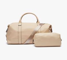 Crafted in classic travel shapes, this is your new go-to, go-anywhere travel set for getaways or weekend escapes. The duffel features vegan leather and tear-resistant lining. Edc Bag, Weekend Escape, Dog Bag, Luxury Aesthetic, Travel Duffle, Travel Set, Travel Collection, Makeup Bags Travel, Work Travel