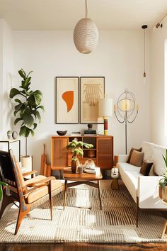 Bright midcentury modern living room with wooden furniture, indoor plants, and stylish decor. Modern Minimalist Style Interior Design, Small Mid Century Modern Living Room Layout, Light Mid Century Modern Living Room, Minimalist Mid Century Living Room, Warm Organic Modern Living Room, Living Room Designs Mid Century Modern